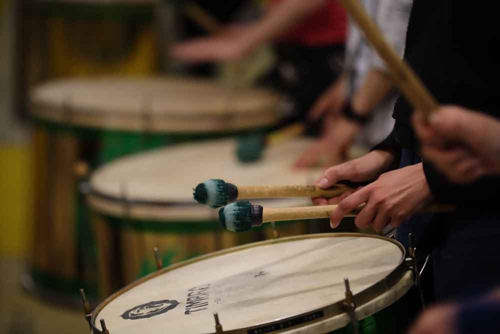 Close-up on surdo players hands